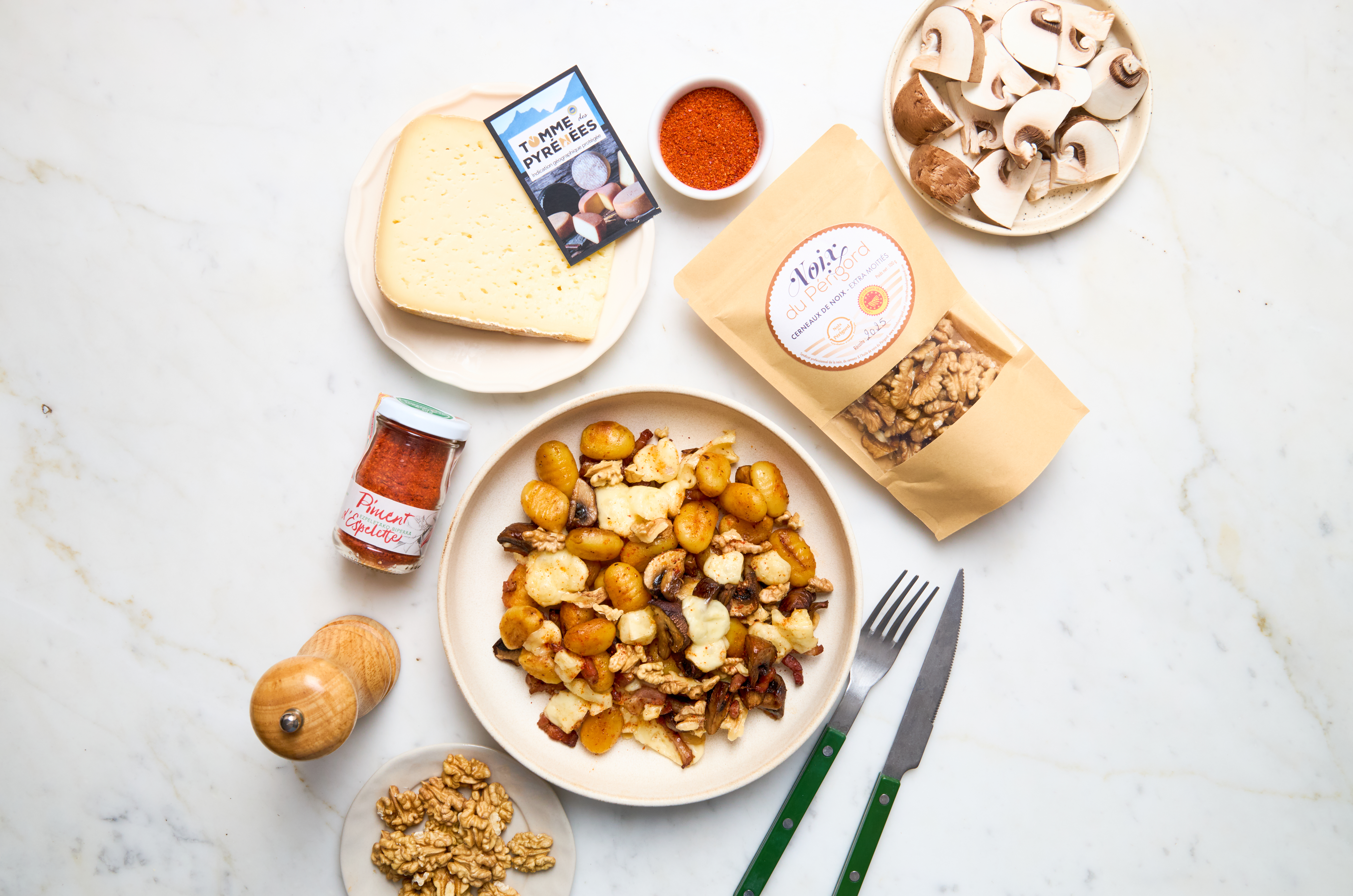 Gnocchis à la Tomme des Pyrénées, champignons, Piment d’Espelette et Noix du Périgord